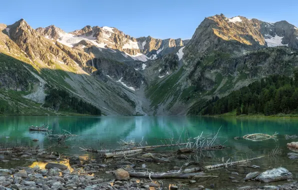 Mountains, lake, stones, shore, logs