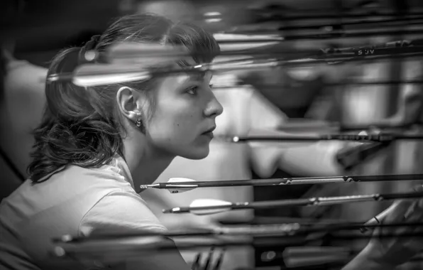 Girl, arrows, target