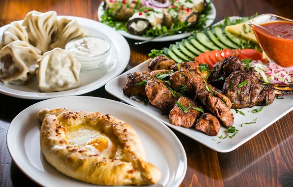 Picture meat, khinkali, khachapuri, adjika