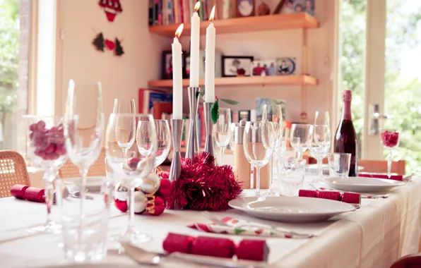 Table, candles, devices, glasses, champagne, serving