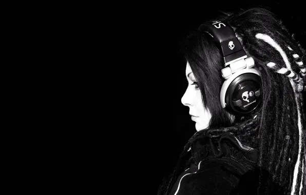 Girl, headphones, black background
