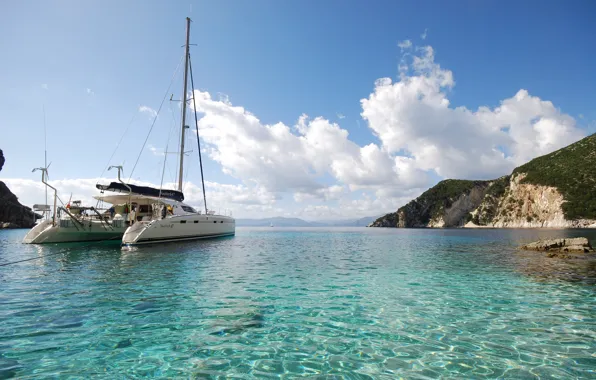Sea, shore, catamaran
