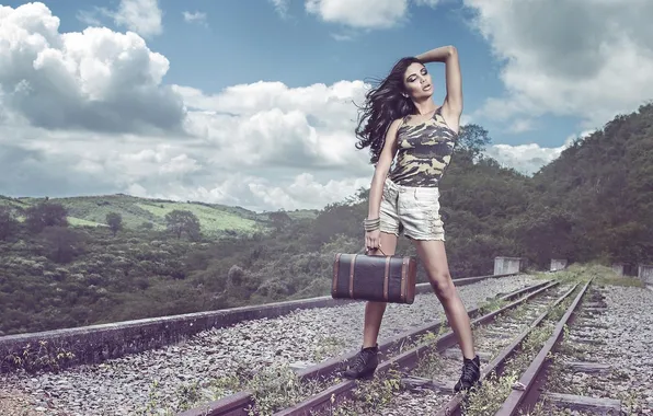 Rails, suitcase, Paula Brandao