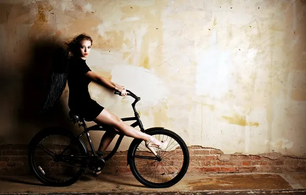 Picture girl, bike, wall