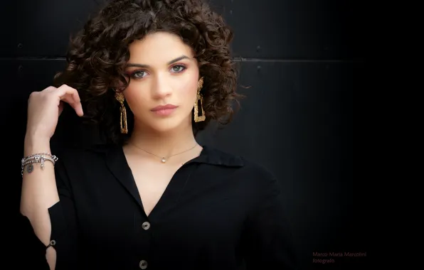 Picture the dark background, portrait, earrings, brunette, bracelet, beautiful girl, black blouse, Marco Maria Marcolini