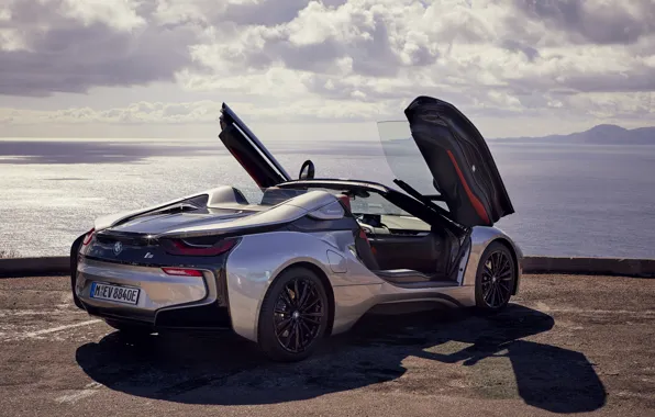 Picture the sky, water, clouds, grey, shadow, door, BMW, horizon