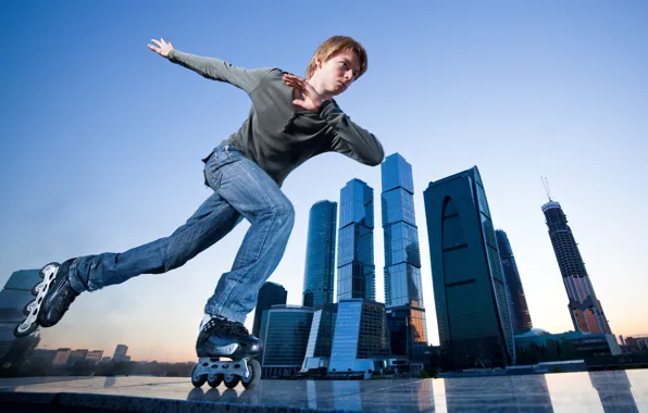 Picture the city, sport, jeans, skyscrapers, videos, t-shirt, guy, leisure