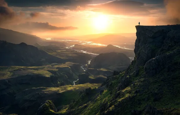 The sky, the sun, clouds, mountains, fog, rock, river, open