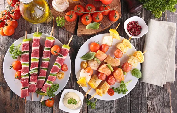 Oil, plate, meat, vegetables, tomatoes, spices, kebabs