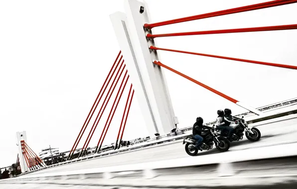 Picture bridge, ducati, motorcyclists