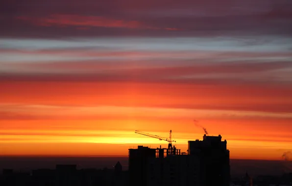 The sky, the sun, the city, dawn