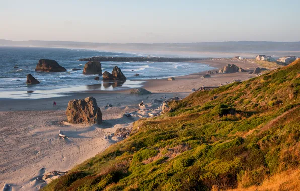 Sea, the sky, grass, mountains, stones