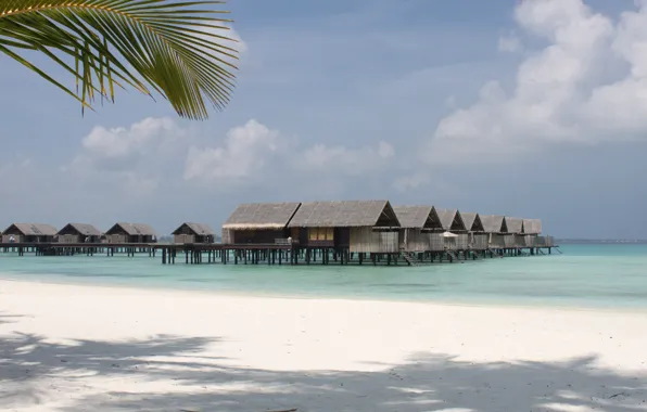 The Maldives, blue water, Paradise island, Bungalow on the sea on stilts