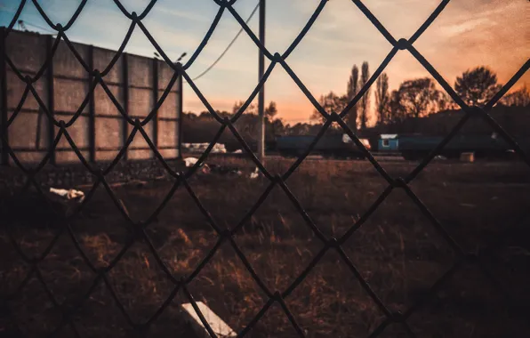 Sadness, the sun, sunset, yellow, the city, garbage, mesh, dark