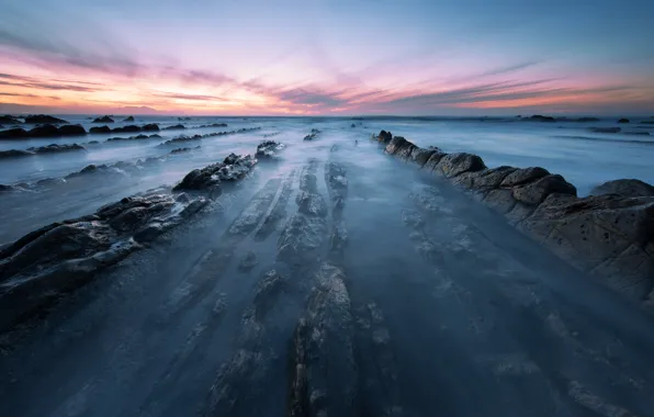 Sea, the sky, rocks, the evening, excerpt, Spain