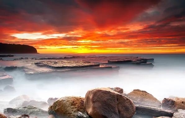 Picture sea, the sky, stones, red sunset