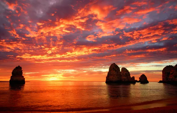 Sea, clouds, sunset, rocks