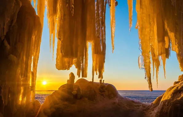 Ice, sea, the sky, the sun, sunset, icicles, cave