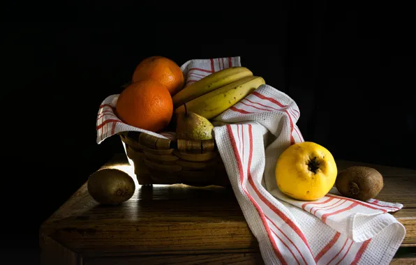 Light, the dark background, table, towel, oranges, kiwi, bananas, fruit