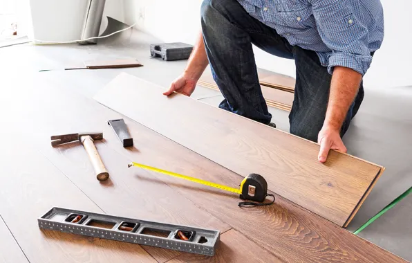 Picture professional, worker, hand tools, floating floors