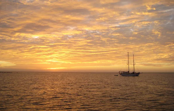 The ocean, sailboat, the evening