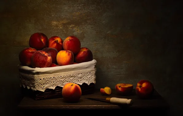 The dark background, table, knife, still life, box, peaches
