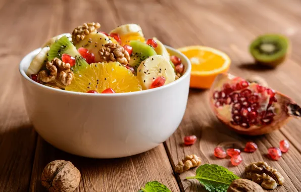 Orange, kiwi, fruit, nuts, banana, garnet, salad