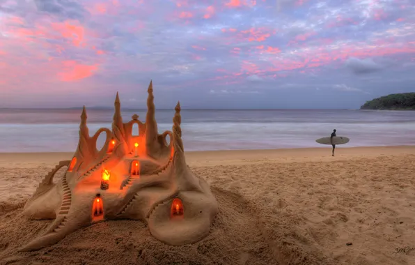 Picture sand, sea, beach, candles, sand castle