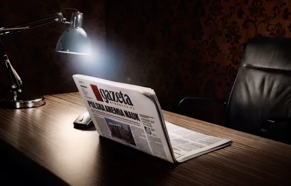 Picture table, lamp, newspaper, twilight