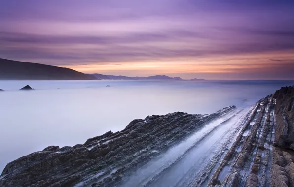 Picture rocks, shore, the evening, Bay, Spain, tide, lilac sky, orange sunset