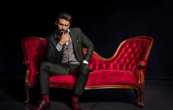 Look, style, the dark background, gesture, fashion, handsome man, sitting on the sofa