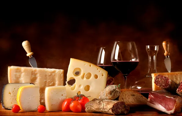 Wine, cheese, glasses, bread, meat, pitcher, tomatoes