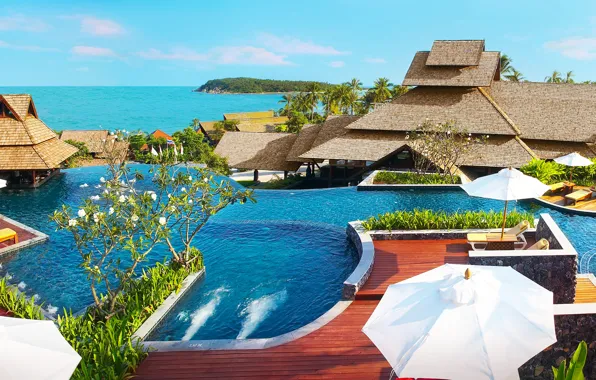 Picture the ocean, pool, the hotel, resort