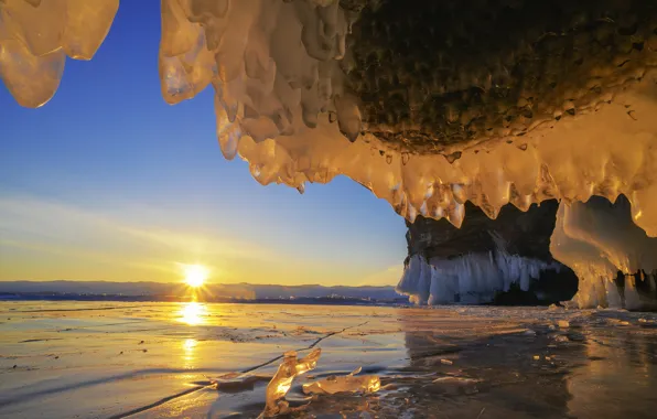 Ice, rays, dawn, the grotto, lake Baikal, Vladimir Ryabkov