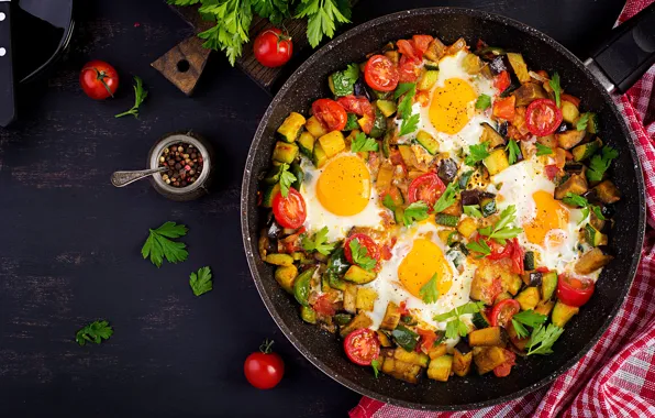 Greens, eggs, vegetables, tomatoes, shakshuka