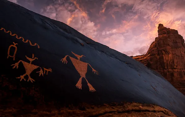 Picture the sky, mountains, figure