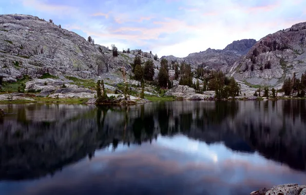 The sky, clouds, trees, mountains, lake