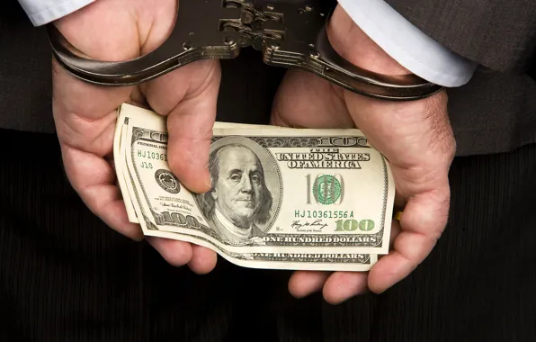 Close-up, the situation, hands, costume, male, dollars, handcuffs, the bucks