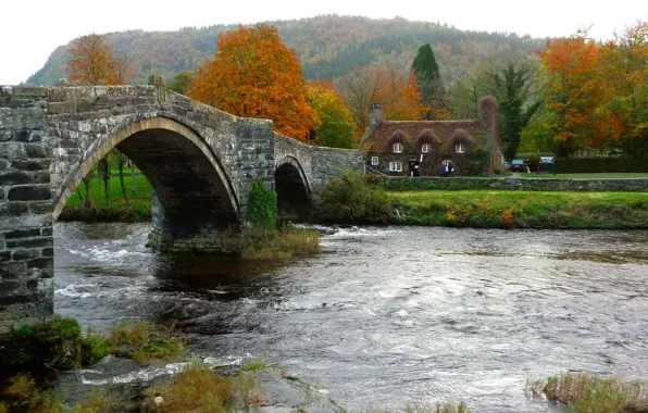 The sky, clouds, trees, bridge, house, river, arch