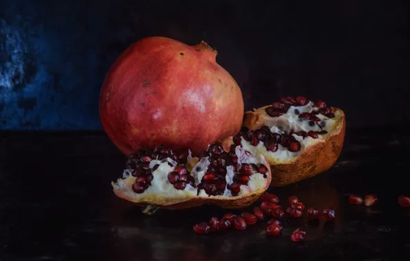 The dark background, food, fruit, still life, placer, halves, grenades, grain