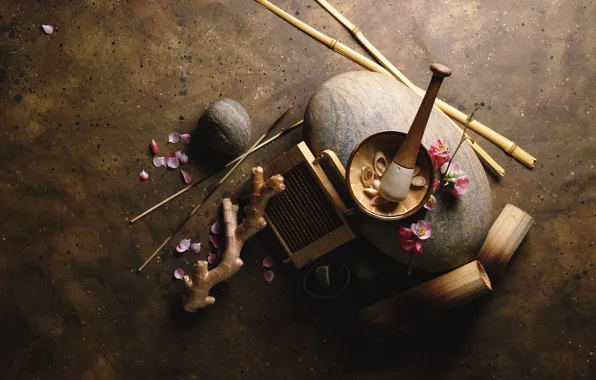 Picture root, sticks, bamboo, petals, pistil, mortar