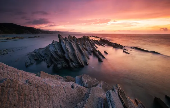 Picture sea, beach, sunset, rocks