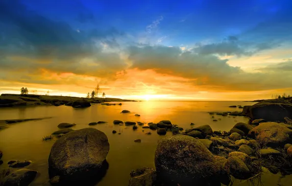 The sky, clouds, landscape, stones, shore