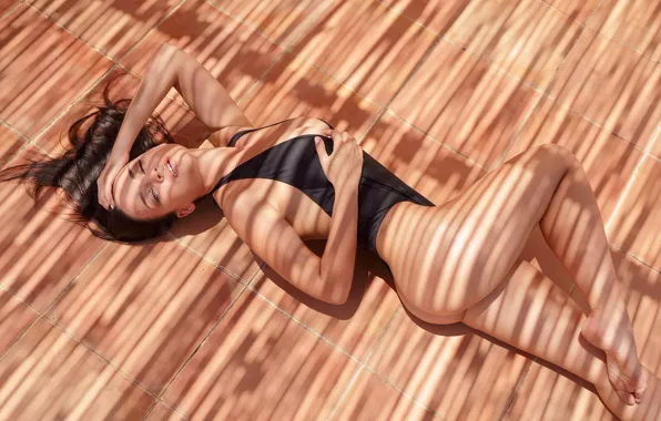 Swimsuit, pose, model, figure, brunette, lies, on the floor, photographer