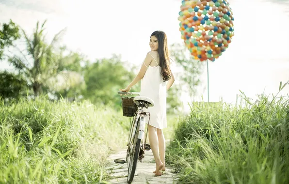 Picture girl, bike, balls