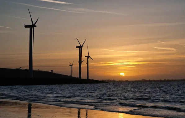 Sea, sunset, windmills