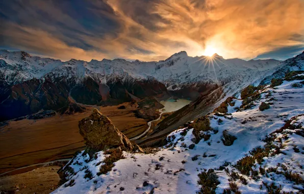 Picture the sun, snow, mountains