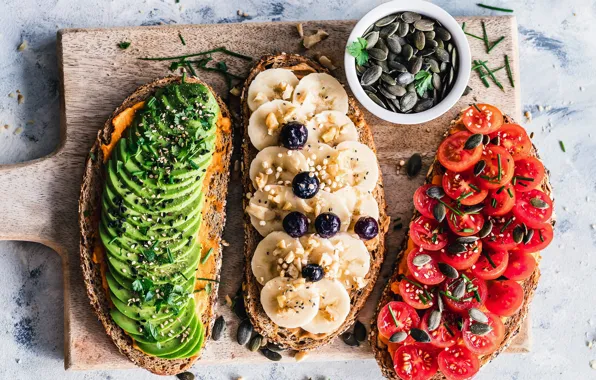 Blueberries, Board, banana, seeds, tomatoes, avocado, sandwiches