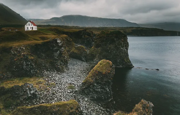 Sea, clouds, stones, rocks, house