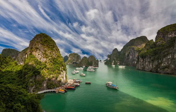 The sky, clouds, light, mountains, rocks, ships, boats, pier